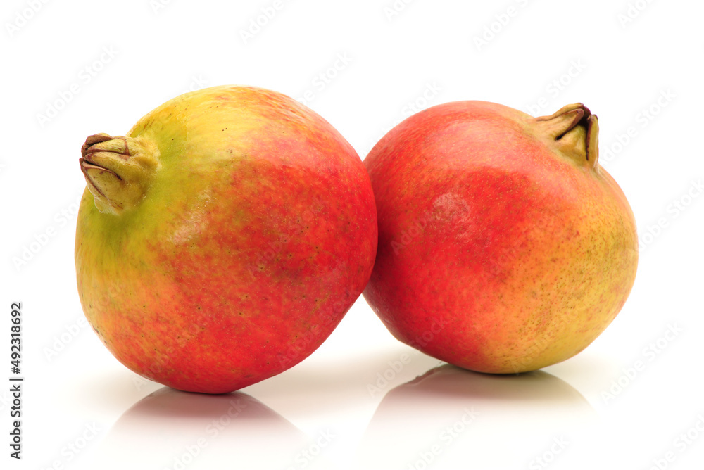 Ripe pomegranate fruit isolated on white background 