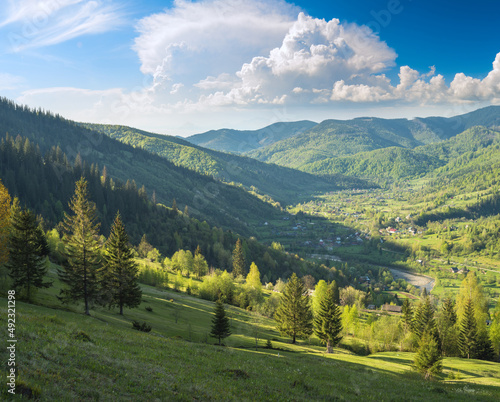 Alpine mountain village in a river valley