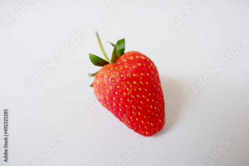 Bright red strawberries on a white background.