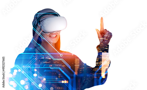 Businesswoman in casual wear wearing vr helmet. Digital interfac photo