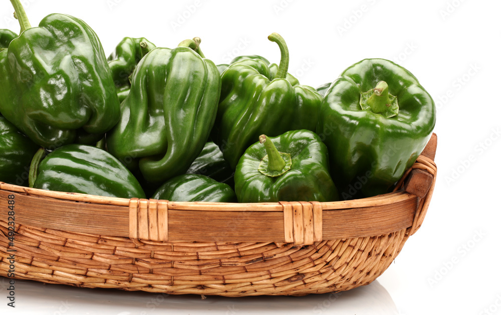 fresh green bell pepper (capsicum) on a white background fresh green bell pepper (capsicum) on a white background