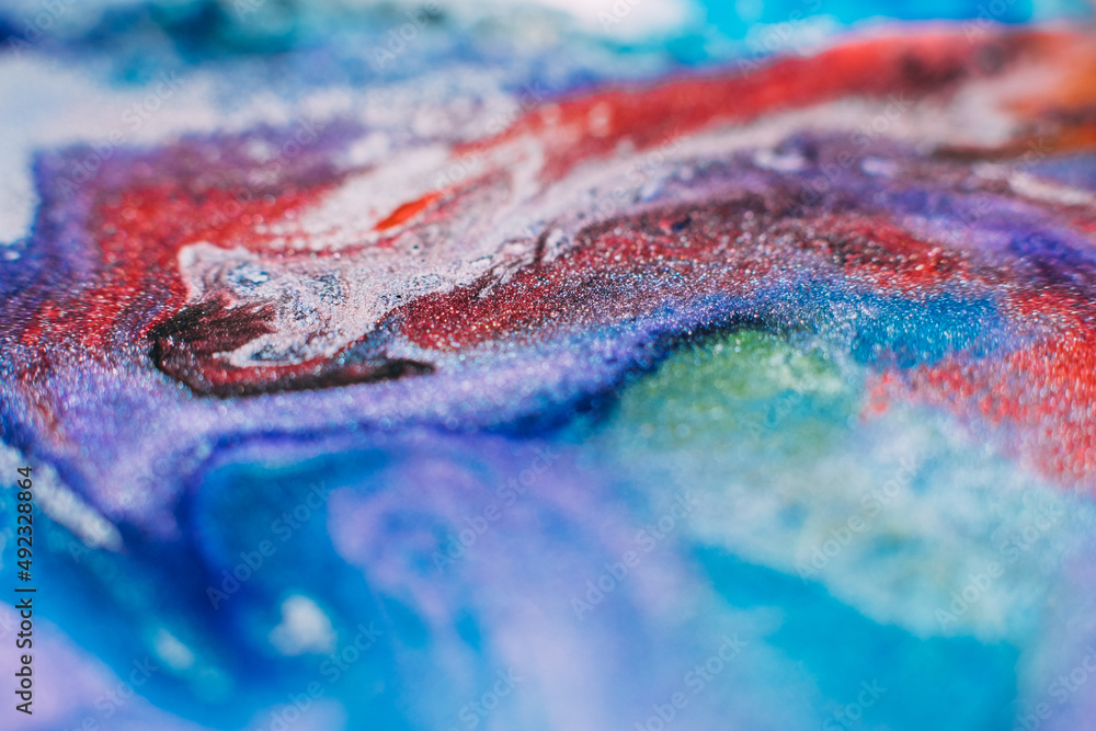 Obraz premium Fluid inks. Multicolor artistic background. Purple lavender pink blue paints mix