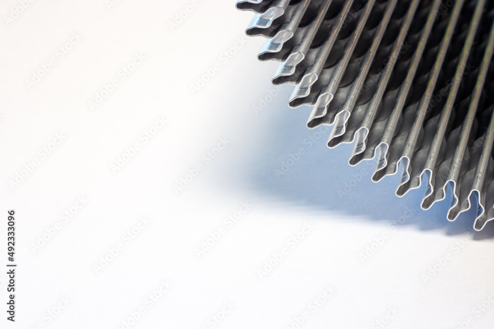shiny metal corrugation. bent aluminum foil lamella. shiny metal corrugation. bent aluminum foil lamella.