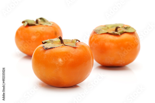 persimmon on a white background photo