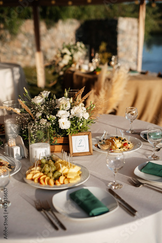 Photo wedding festive banquet outdoors