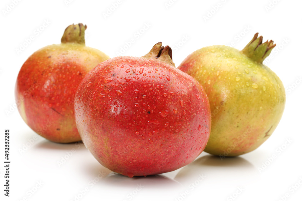 Ripe pomegranate fruit isolated on white background Ripe pomegranate fruit isolated on white background