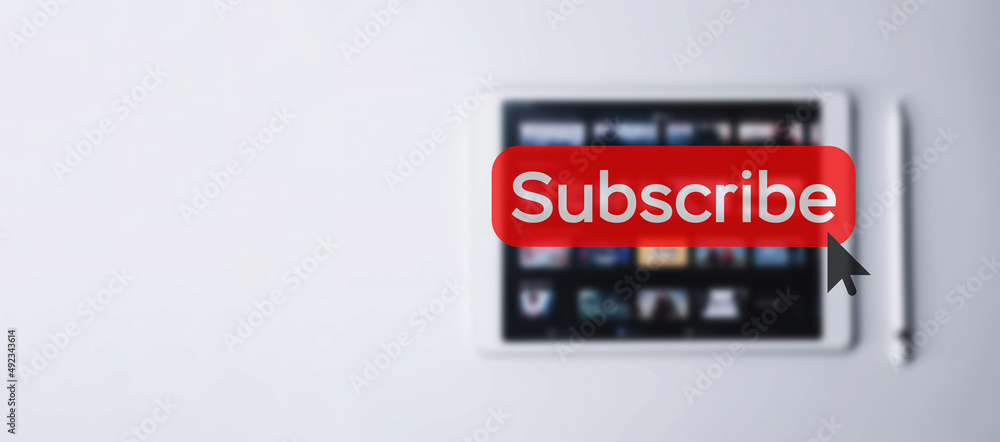 Subscribe button. Online video subscription red button. Internet service on laptop digital tablet blured banner background. Visual contents concept. Social networking service.