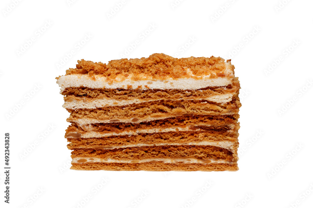 A piece of honey cake, isolated on a white background A piece of honey cake, isolated on a white background