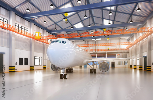 commercial airplane in hangar
