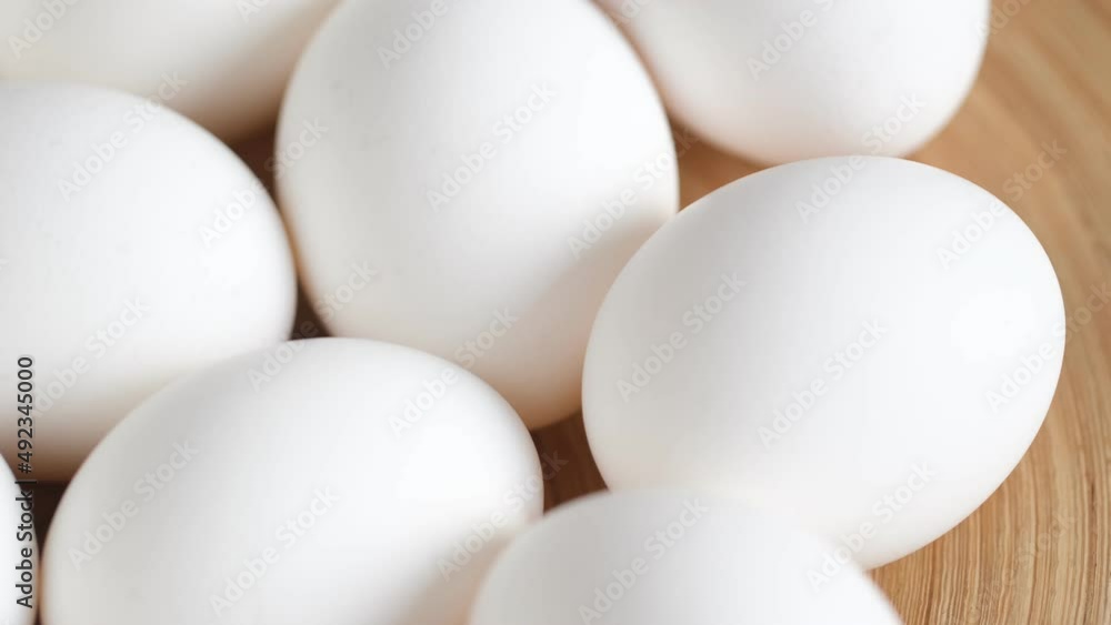 Chicken egg, rotation shot, Chicken fresh raw eggs.Healthy fresh food ingredients for breakfast. Animal products. Grocery. Chicken farm fresh eggs Chicken egg, rotation shot, Chicken fresh raw eggs.Healthy fresh food ingredients for breakfast. Animal products. Grocery. Chicken farm fresh eggs