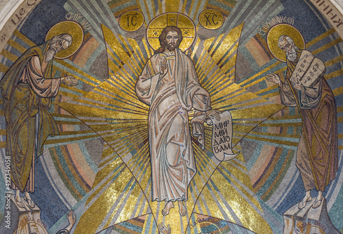 Mosaic icon of the Transfiguration of the Lord on the apse of the church photo
