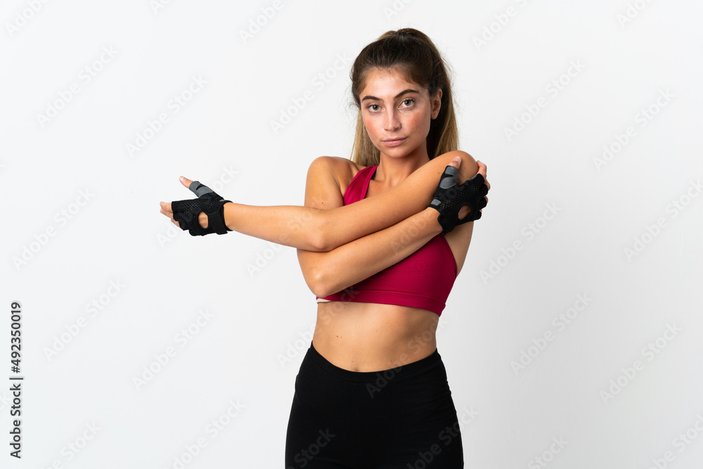 Young caucasian woman isolated on white background stretching arm Young caucasian woman isolated on white background stretching arm