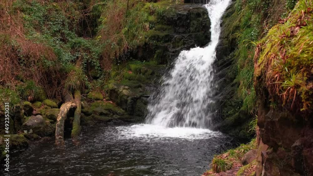Spectacular 4K slow motion video of O'Sullivans cascades waterfall among picturesque surroundings, Kerry, Ireland Spectacular 4K slow motion video of O'Sullivans cascades waterfall among picturesque surroundings, Kerry, Ireland