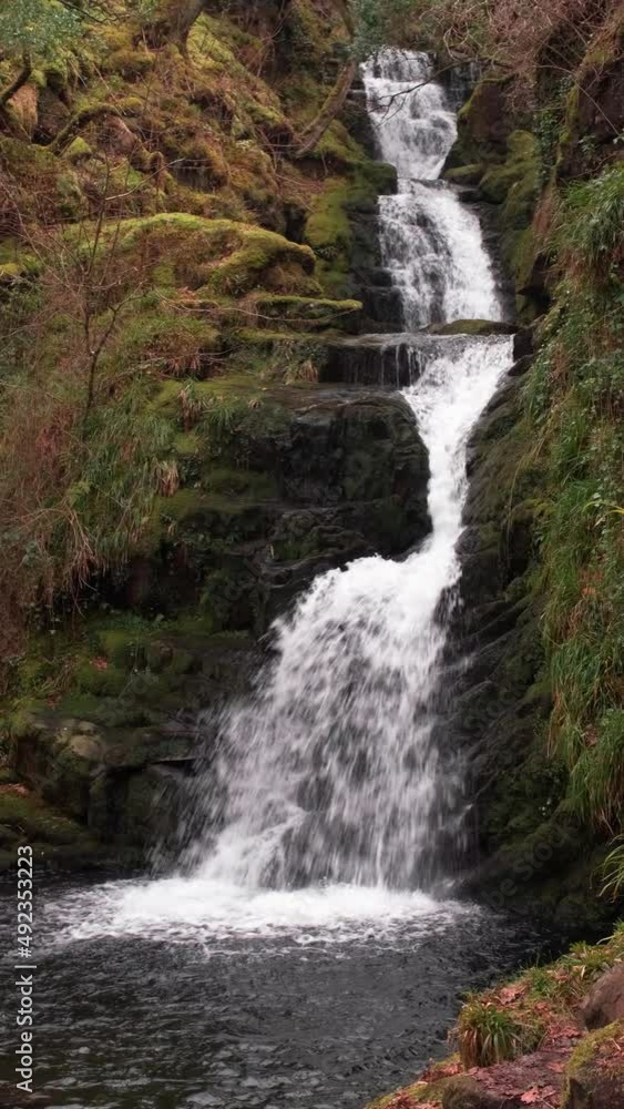 Spectacular 4K slow motion video of O'Sullivans cascades waterfall among picturesque surroundings, Kerry, Ireland Spectacular 4K slow motion video of O'Sullivans cascades waterfall among picturesque surroundings, Kerry, Ireland