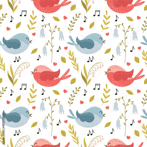 Seamless pattern with cute cartoon flying singing birds and spring flowers, lily of the valley, bluebell, herbs and twigs. For baby textiles. Color vector illustration on a white background.