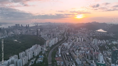 Wallpaper Mural Drone fly over Shenzhen city central business district, aerial panorama China at twilight. Torontodigital.ca