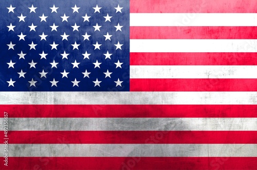 Vintage image of the national flag of USA on a metal surface. Background.