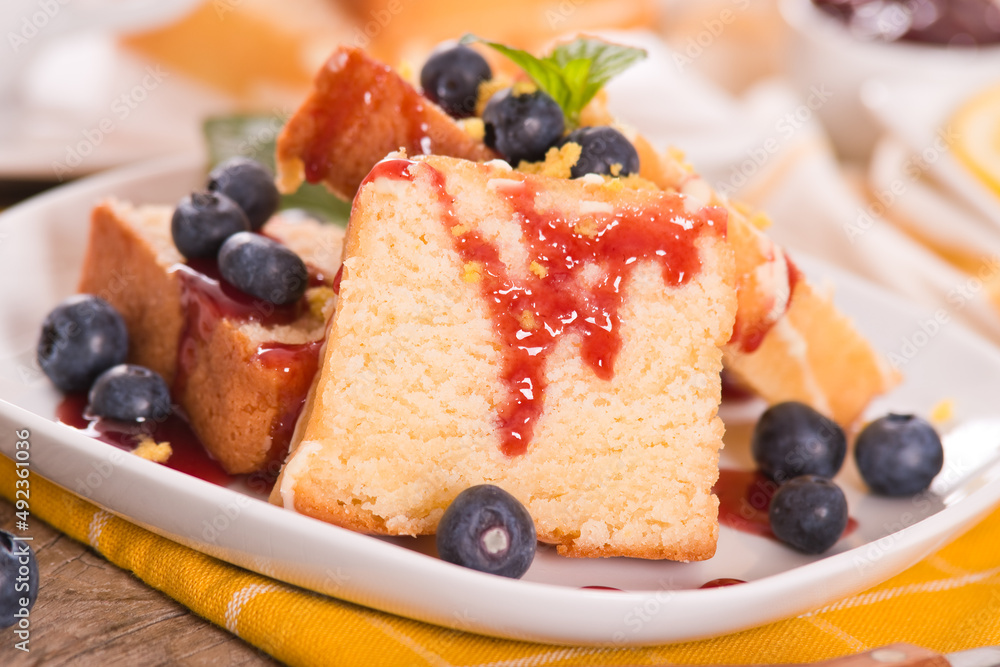 Lemon pund cake with blueberries and strawberry syrup. Lemon pund cake with blueberries and strawberry syrup.