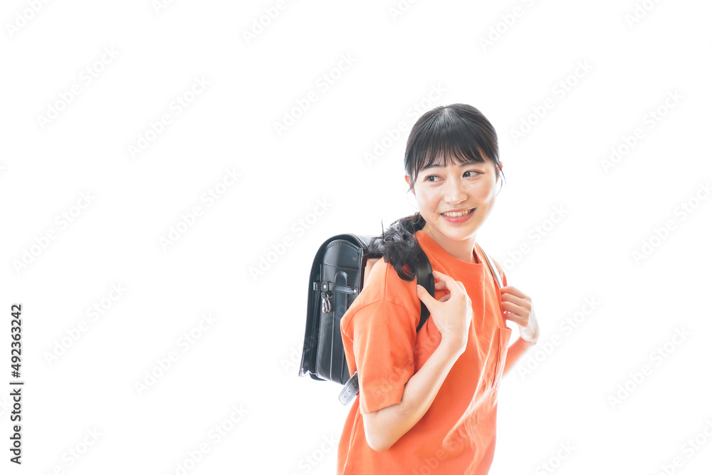 ランドセルを背負った若い女性 ランドセルを背負った若い女性