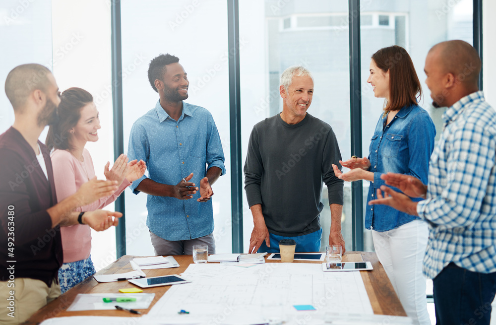 Fototapeta premium Working together to design your dreams. Cropped shot of a group of architects in the boardroom.