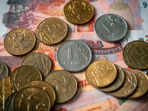 Russian money coins and banknotes. Rubles cash. Russian roubles. Economic crisis in Russia. Special military operation in Ukraine aftermath. Currency exhange. Bribery and corruption. Money laundering
