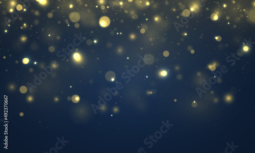 Blue lights bokeh  golden sparkles background.