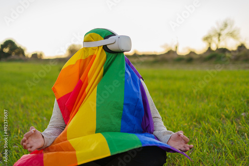 LGBT person meditating in VR headset in nature