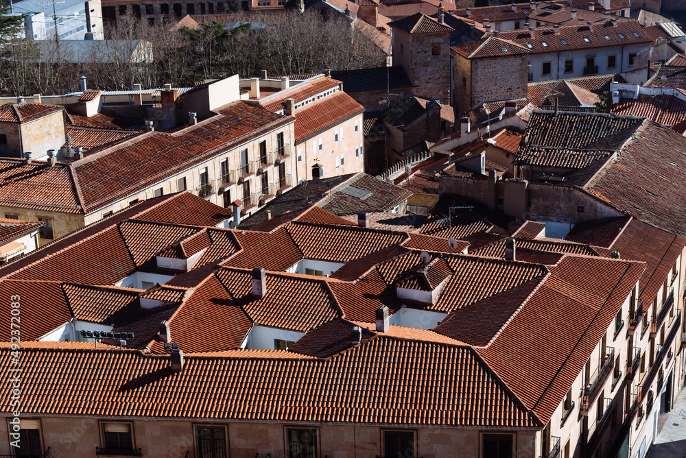 Aerial top panoramic view of historic centre of the medieval town of Salamanca with old buildings and typical terracotta tiled roofs. Castile and Leon, Spain Aerial top panoramic view of historic centre of the medieval town of Salamanca with old buildings and typical terracotta tiled roofs. Castile and Leon, Spain