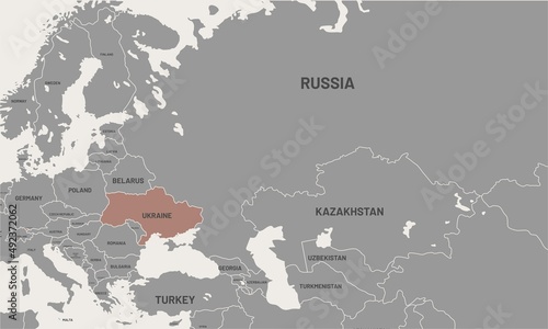 Ukraine on world map. Ukraine colored differently from other countries. Vector map design photo