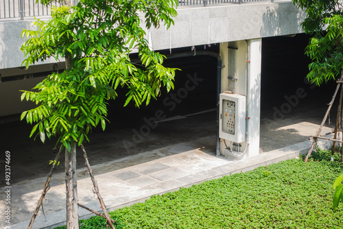 Electric control panel at cement pillar of builidng