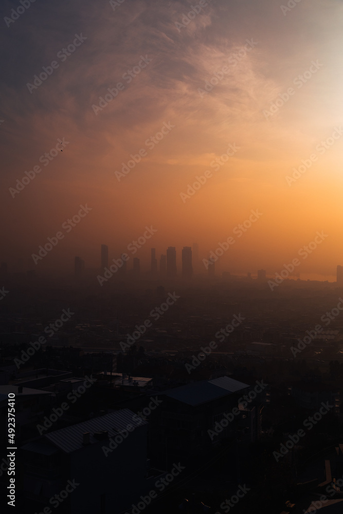 Naklejka premium sunrise over the city