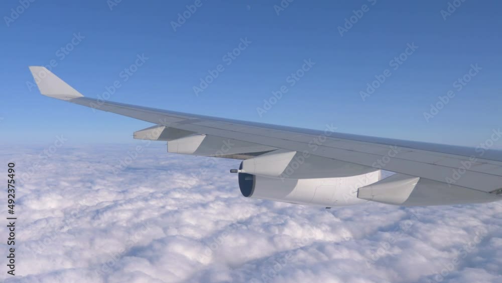 Airplane flight above the clouds in 4K Airplane flight above the clouds in 4K
