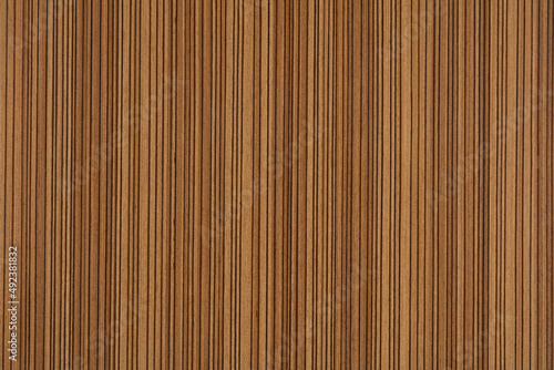 Classic Zebrano veneer background in brown color for your unique interior.