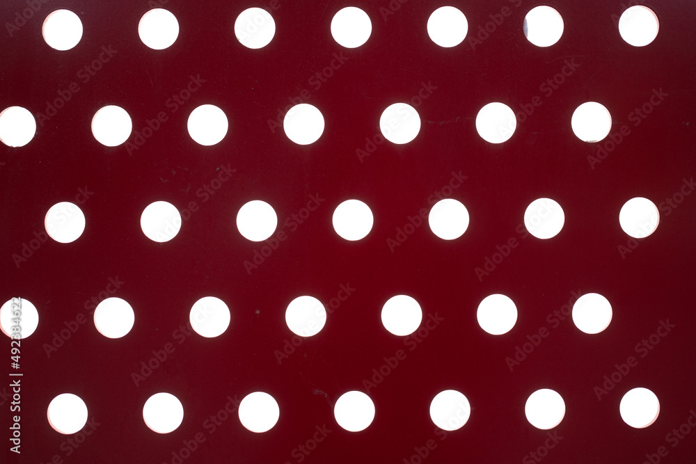 WHITE DOTS on a red background