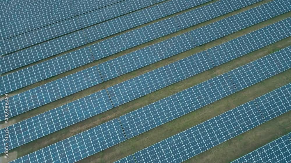 Aerial view of Solar Panels Farm solar cells. Renewable green alternative energy concept. Aerial view of Solar Panels Farm solar cells. Renewable green alternative energy concept.