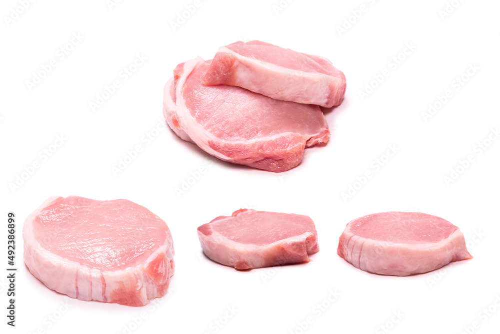 Raw pork pieces isolated on a white background. Raw pork pieces isolated on a white background.