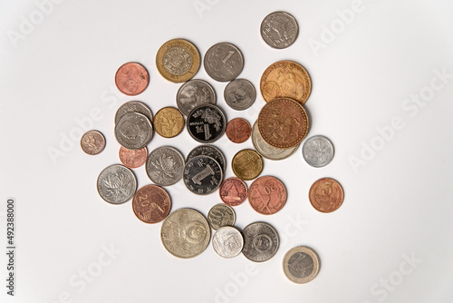 Coins on a light background. A handful of coins. A scattering of coins. Antique Coins photo