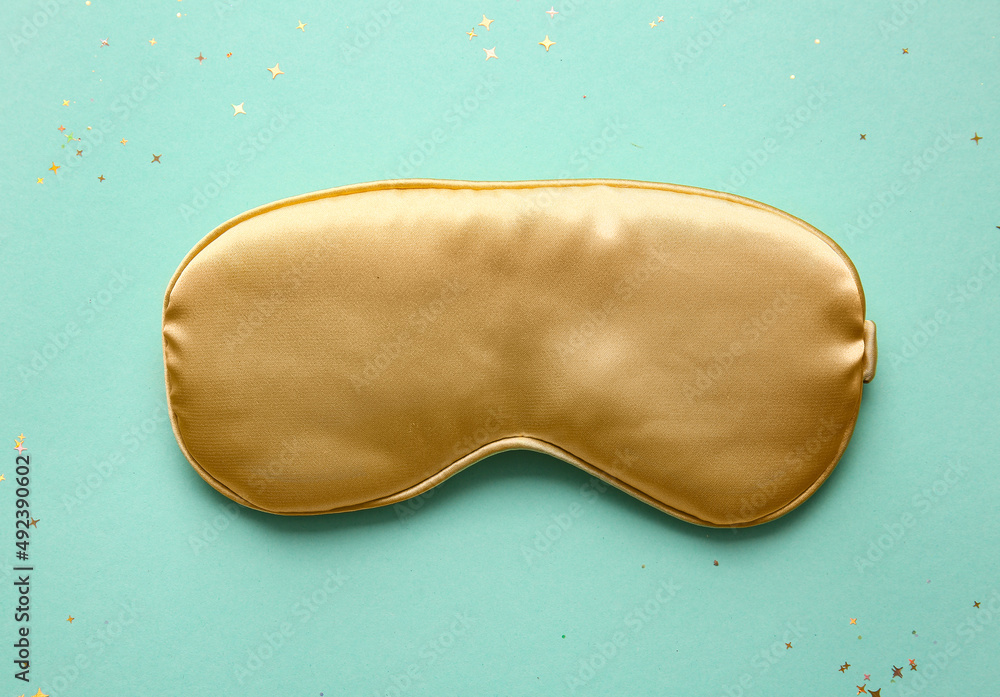 Fototapeta premium Sleep mask on green background