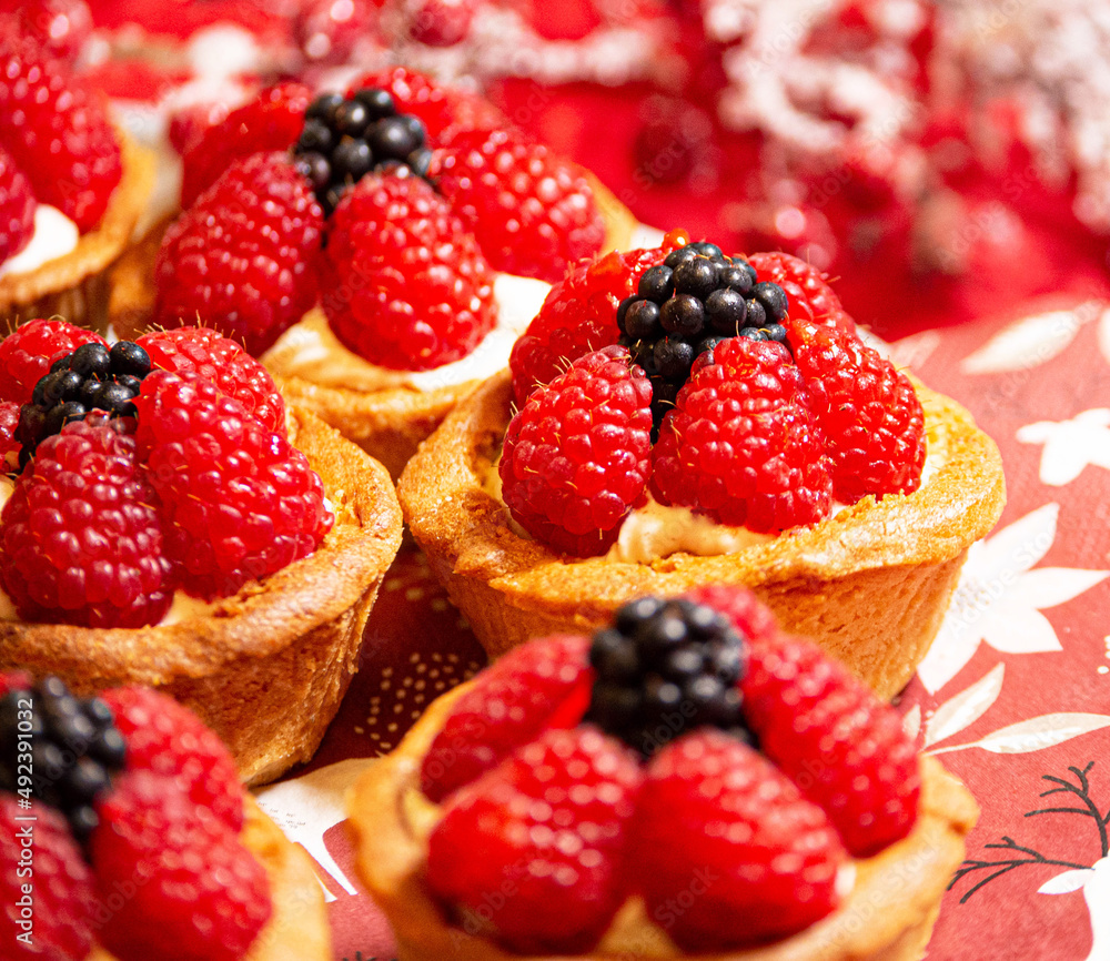 Freshly baked baskets with curd cream and strawberries Freshly baked baskets with curd cream and strawberries