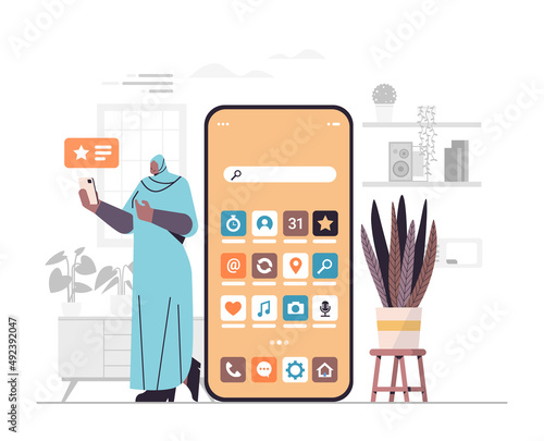 arab woman holding smartphone girl using online mobile app social media communication concept