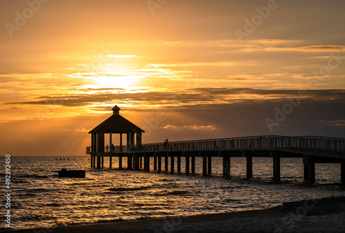 Sunset behind the pier