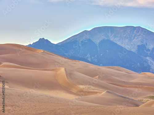 sunset image of the great sand dunes near the San Juan Mountains of Colorado