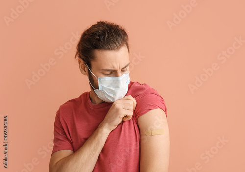Young man in medical mask a...