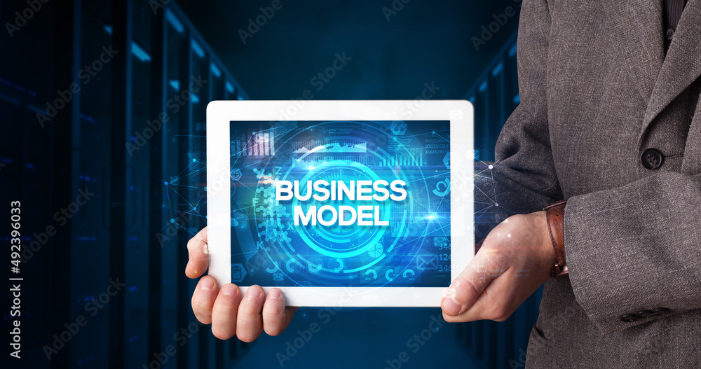 Person holding tablet, business concept Person holding tablet, business concept