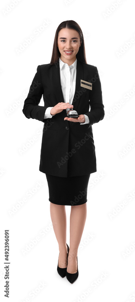 Happy young receptionist in uniform holding service bell on white background Happy young receptionist in uniform holding service bell on white background