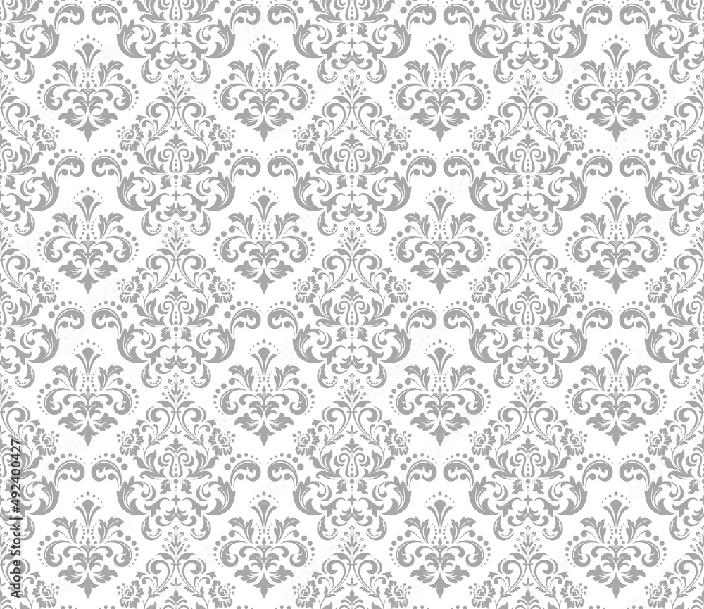 Floral pattern. Vintage wallpaper in the Baroque style. Seamless vector background. White and gray ornament for fabric, wallpaper, packaging. Ornate Damask flower ornament.