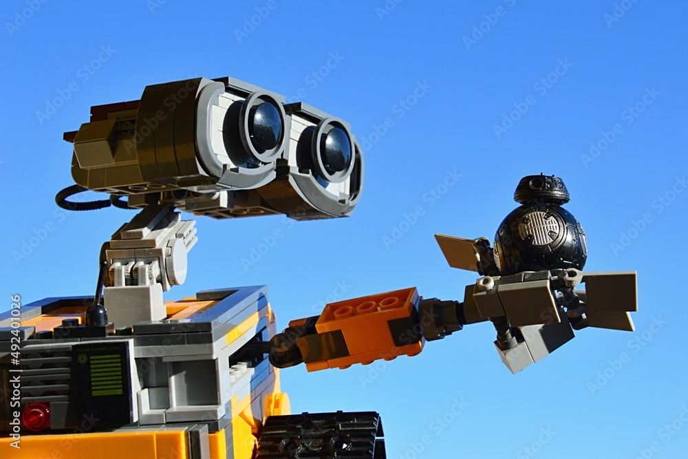 LEGO WallE robot model from Disney Pixar movie holding small model of
