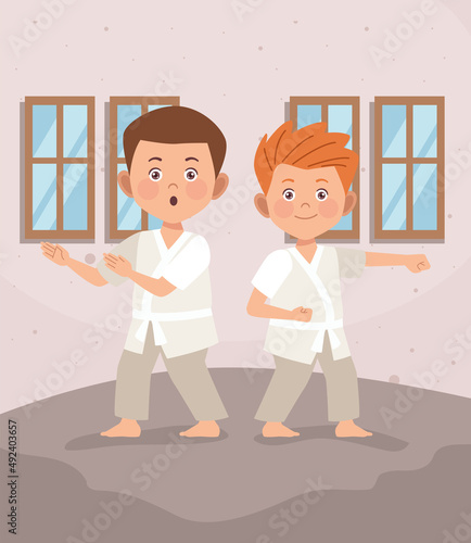 boys couple practicing karate indoor