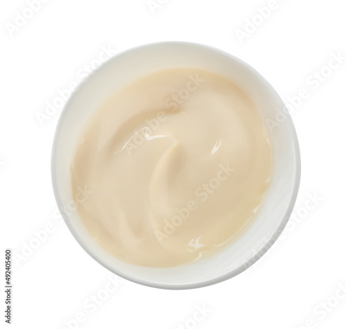 Mayonnaise in ceramic bowl isolated on white, top view