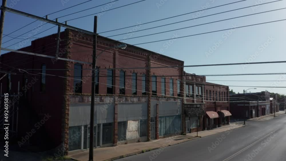 Vacant storefronts and empty sidewalks in small town America. Vacant storefronts and empty sidewalks in small town America.
